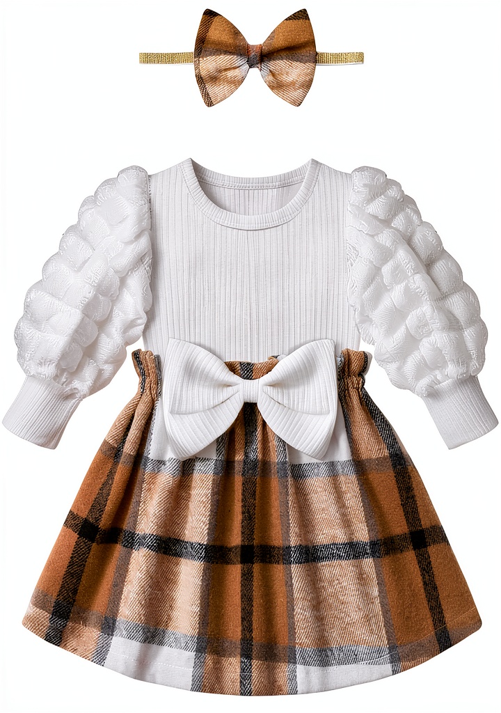 Baby girl wearing puff sleeve plaid dress during holiday family gathering